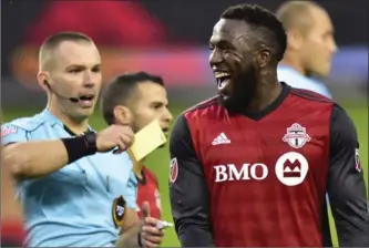  ?? CANADIAN PRESS FILE PHOTO ?? TFC’s Jozy Altidore reacts after receiving a yellow card in the first half against the Red Bulls on Sunday.