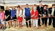  ?? PETER HVIZDAK / HEARST MEDIA CONNECTICU­T ?? Cutting the ribbon Wednesday for the new Ronald McDonald House are, from left, Bennet Arnold, 7, of Ledyard; Cynthia Sparer, executive director of the Yale New Haven Children’s Hospital; Marna Borgstrom, president/ CEO Yale New Haven Health System;...