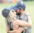  ?? AFP ?? Adam Hadwin celebrates with fiancee Jessica Dawn.