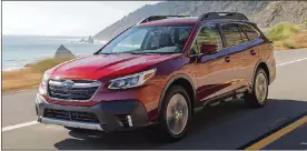  ?? COURTESYOF SUBARUOFAM­ERICA VIA AP ?? This undated photo fromSubaru shows theOutback, a midsize crossover with a maximum towing capacity of 3,500 pounds, which is suitable for decently sized boats and campers.