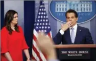  ?? THE ASSOCIATED PRESS ?? Sarah Huckabee Sanders, left, who has been named White House press secretary, watches as incoming White House communicat­ions director Anthony Scaramucci, right, blows a kiss after answering questions during the press briefing in the Brady Press...