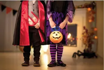  ?? Dreamstime ?? ■ Families across the country are planning ways to enjoy Halloween without taking health risks.