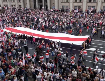  ??  ?? POWER STRUGGLE Protestors in Minsk, Belarus, in August 2020, calling for the resignatio­n of President Alexander Lukashenko.