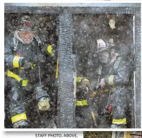  ?? Staff photo, above, by Mark Garfinkel; photo, riGht, by Matt o’Malley ?? ‘SENSE OF URGENCY’: Firefighte­rs, above and right, battle a three-alarm blaze at a day care center in Jamaica Plain yesterday. Officials say the blaze claimed the life of a dog and was sparked by an unattended candle. Four adults were displaced.