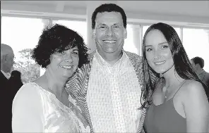  ??  ?? University of Central Arkansas men’s basketball Coach Russ Pennell with his wife, Julie Pennell, and daughter, Morgan Pennell, all of Conway