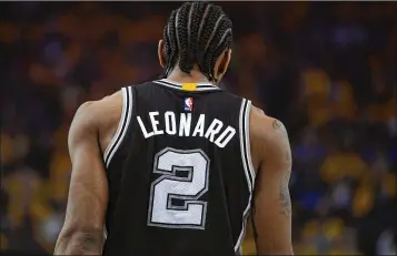  ?? THEARON W. HENDERSON / GETTY IMAGES ?? Spurs All-Star Kawhi Leonard reportedly told San Antonio he wants to be traded, preferably to the Lakers. Leonard played just nine games last season because of a quad injury.