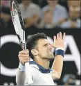  ?? SAEED KHAN — AFP/GETTY IMAGES ?? Novak Djokovic reacts during his fourth-round loss to Hyeon Chung.