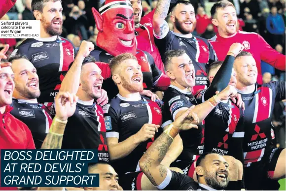  ??  ?? Salford players celebrate the win over Wigan