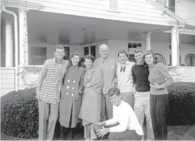  ?? Photos by Kennedy Family Collection, Courtesy of the John F. Kennedy Library Foundation ?? The Kennedy family poses in Hyannis Port, Mass., around 1948. From left: John F. Kennedy, Jean Kennedy, Rose Kennedy, Joseph P. Kennedy Sr., Patricia Kennedy, Robert F. Kennedy, Eunice Kennedy, and in foreground, Edward M. Kennedy.