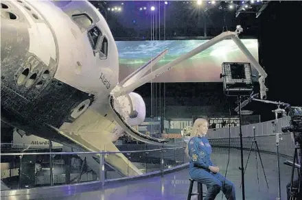  ?? COURTESY PHOTOS ?? “Fly
Like a Girl” features author and scientist Abigail “Astronaut Abby” Harrison in front of the Space Shuttle Atlantis at Kennedy Space Center.