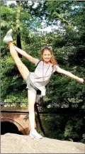  ?? Photo Submitted ?? Samantha Handcock Blair practiced a heel stretch in Central Park during her trip to New York, N.Y. for the All Star Dancers National Convention in New York City. Samantha’s mom, Angela Blair, said she practices 24/7.