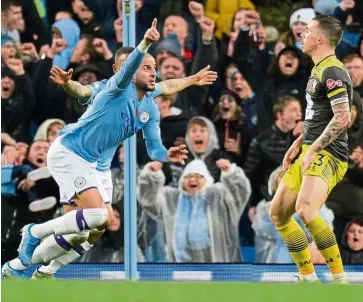  ?? — reuters ?? Simply magical: Manchester City’s Kyle Walker celebrates scoring their second goal against Southampto­n in the Premier League match at the etihad on Saturday.