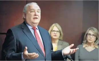  ?? RICARDO RAMIREZ BUXEDA/ORLANDO SENTINEL ?? Universal CEO John Sprouls speaks Monday during a news conference at the Orange County Administra­tion Center.