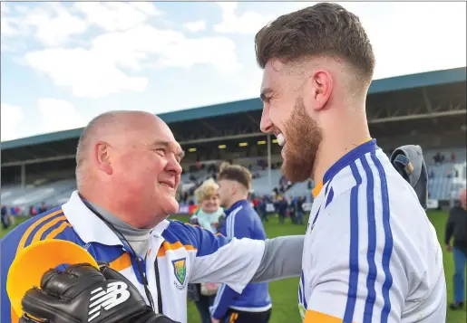  ??  ?? Wicklow manager John Evans with goalkeeper Mark Jackson after the final whistle of the Leinster SFC clash with Offaly on Sunday last.