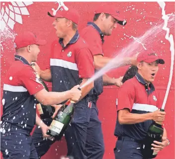  ?? ?? Team USA celebrates at the closing ceremony after the Ryder Cup matches at the Whistling Straits Golf Course Sunday, Sept. 26, 2021, in Sheboygan, Wis. (AP Photo/Charlie Neibergall)