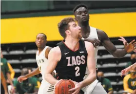  ?? Christine Leung / USF Athletics ?? Gonzaga sophomore Drew Timme made his first eight fieldgoal attempts on his way to 28 points and added 10 rebounds at USF on Saturday.