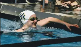  ?? BARRY TAGLIEBER - FOR MEDIANEWS GROUP ?? Spring-Ford’s Ashley Gutshall smiles after finishing the 50-yard freestyle event at Friday’s PAC swimming championsh­ip.