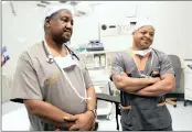  ??  ?? CUT ABOVE: Dr Bongani Mbatha and Dr Morris Choke marked Mandela Day by operating free of charge.