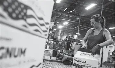  ?? PHOTO FOR THE WASHINGTON POST BY BRAD VEST ?? Jessica Lopez packages wire coil nails at the Mid Continenta­l Nail Corp. in Poplar Bluff, Mo.