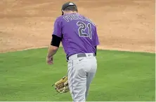  ?? Matt York, The Associated Press ?? Colorado pitcher Kyle Freeland (21) walks off the mound after sustaining an injury Tuesday.