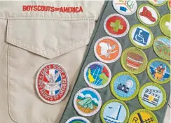  ?? Amy Kerk, Getty Images file ?? An Eagle Scout patch and merit badge sash are displayed on a Boy Scouts of America uniform.