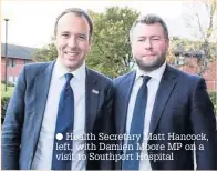  ??  ?? Health Secretary Matt Hancock, left, with Damien Moore MP on a visit to Southport Hospital