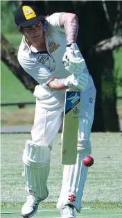  ??  ?? Right: Jindivick coach Steve Dillon defends during a successful run chase in the division two match against Western Park.