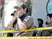  ?? ERIC RISBERG/AP ?? UPS workers gather outside a San Francisco package warehouse after a shooter killed three people and himself.