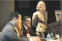  ??  ?? Catherine Smith, head of the state Department of Economic and Community Developmen­t, leads an economic panel discussion in November 2015 at Fairfield University.