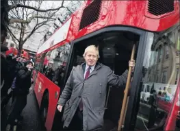  ??  ?? ‘VANITY PROJECT’: London Mayor Boris Johnson on a London Routemaste­r bus