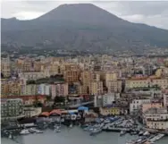  ?? MARIO LAPORTA/AFP/GETTY IMAGES FILE PHOTO ?? Torre del Greco, one of the villages near the Mount Vesuvius volcano. More than 700,000 people live illegally on its slopes.