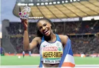 ?? AP ?? Dina Asher-Smith celebrates after winning the women’s 200m final at the European Athletics Championsh­ips. —
