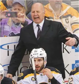  ?? GENE J. PUSKAR ASSOCIATED PRESS ?? Claude Julien derrière le banc des Bruins de Boston