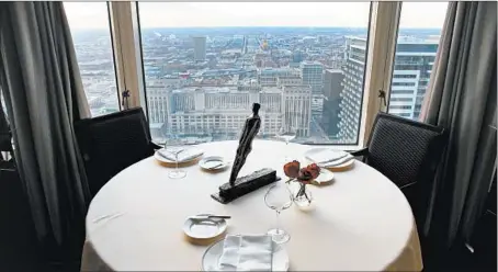  ?? TERRENCE ANTONIO JAMES/CHICAGO TRIBUNE PHOTOS ?? The 40th-floor restaurant with its majestic city view has been a place to which one did not merely arrive; one ascended.