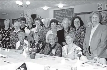  ?? B18twe03 ?? More than 20 ladies gathered at Lochranza tearoom last Friday to celebrate the 80th birthday of their painting class instructor, Agnes Lynch, who has lived and tutored in Lochranza for 22 years.