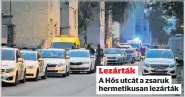  ??  ?? Lezárták
A Hős utcát a zsaruk hermetikus­an lezárták