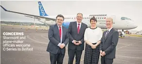  ??  ?? CONCERNS Stormont and plane-maker officals welcome C-series to Belfast
