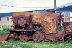  ??  ?? Above and below: Donald the steam train as recovered from a South Island bog in 1990