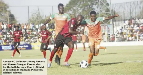  ??  ?? Zanaco FC defender Jimmy Nakena and Zesco's Morgan Kaoma vies for the ball during a Charity Shield at Woodlands Stadium. Picture by Michael Miyoba