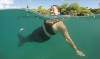  ??  ?? At Hawaii Mermaid Adventures, participan­ts learn about marine protection, while having fun.