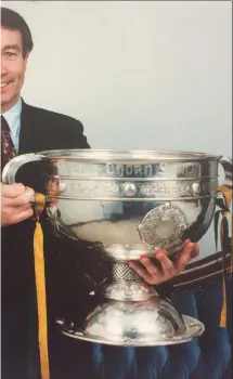  ??  ?? y with the Sam Maguire Cup in 1992 when, as Chairman of the Seán he had the honour of welcoming the All-Ireland winning Donegal m to the twin towns of Ballybofey and Stranorlar.