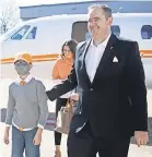  ?? SAUL YOUNG/ NEWS SENTINEL ?? Josh Heupel is accompanie­d by his son Jace as they arrived Wednesday in Knoxville.