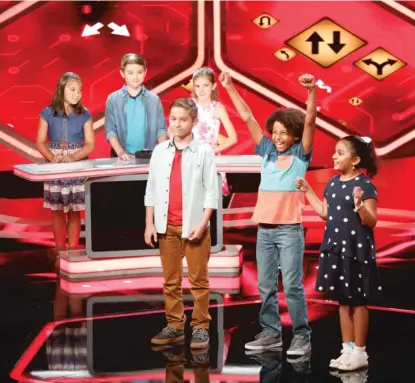  ?? NBC ?? With his team, the Brainy Bunch ( left), Tyler McHugh competed against twin brother Ethan and his team, the Superlativ­es, on a March episode of “Genius Junior.”