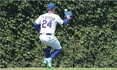  ?? GETTY IMAGES ?? Joc Pederson can’t track down a double by Jon Berti in the sixth inning. David Ross has praised Pederson for setting “a really nice tone.”