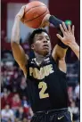  ?? (AP/Doug McSchooler) ?? Purdue guard Eric Hunter Jr. and the Boilermake­rs defeated Indiana 74-62 on Saturday. With three consecutiv­e victories, the Boilermake­rs have improved their chances of making the NCAA Tournament.