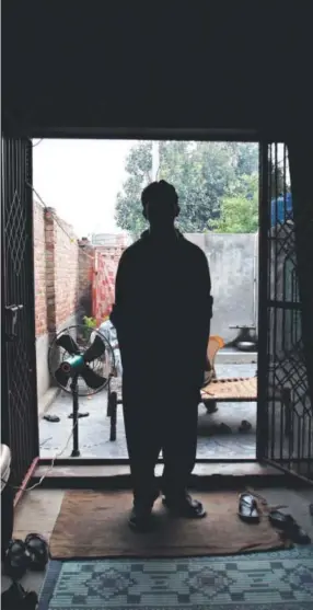  ??  ?? A victim of a child sex abuse scandal stands in his house in Pakistan on Monday. Families kept quiet for years about the blackmail gang that locals believe filmed some 270 children being sexually abused. Anjum Naveed, The Associated Press