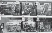  ?? JUSTIN SULLIVAN TNS ?? ‘Star Wars’-themed Lego sets are displayed on a shelf at a Target store in San Rafael, California. Some of these sets can sell for more than $1,000 on the secondhand market.