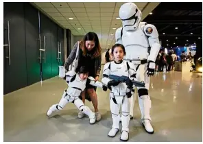  ??  ?? A family dressed as Stormtroop­ers at the 2016 Asia Pop Comic Con in Manila, the Philippine­s, in this EPA pic. This year, Asia Comic Con will be held in Sunway Pyramid Convention Centre, Petaling Jaya.