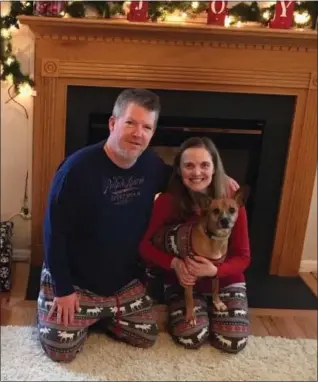  ?? SUBMITTED PHOTO ?? Author Mercy Mize and Samson, right, with Mize’s husband Brian.