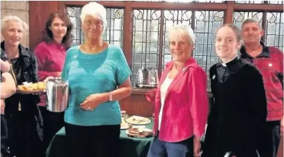  ??  ?? Rev Penny King (second right) with helpers and visitors at St Nicholas Church in Newchurch